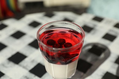 Photo of Delicious panna cotta dessert on table, closeup