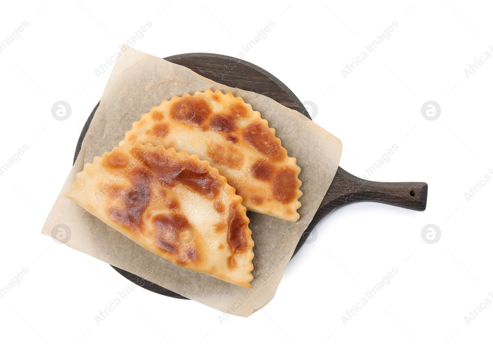 Photo of Board with delicious fried chebureki isolated on white, top view