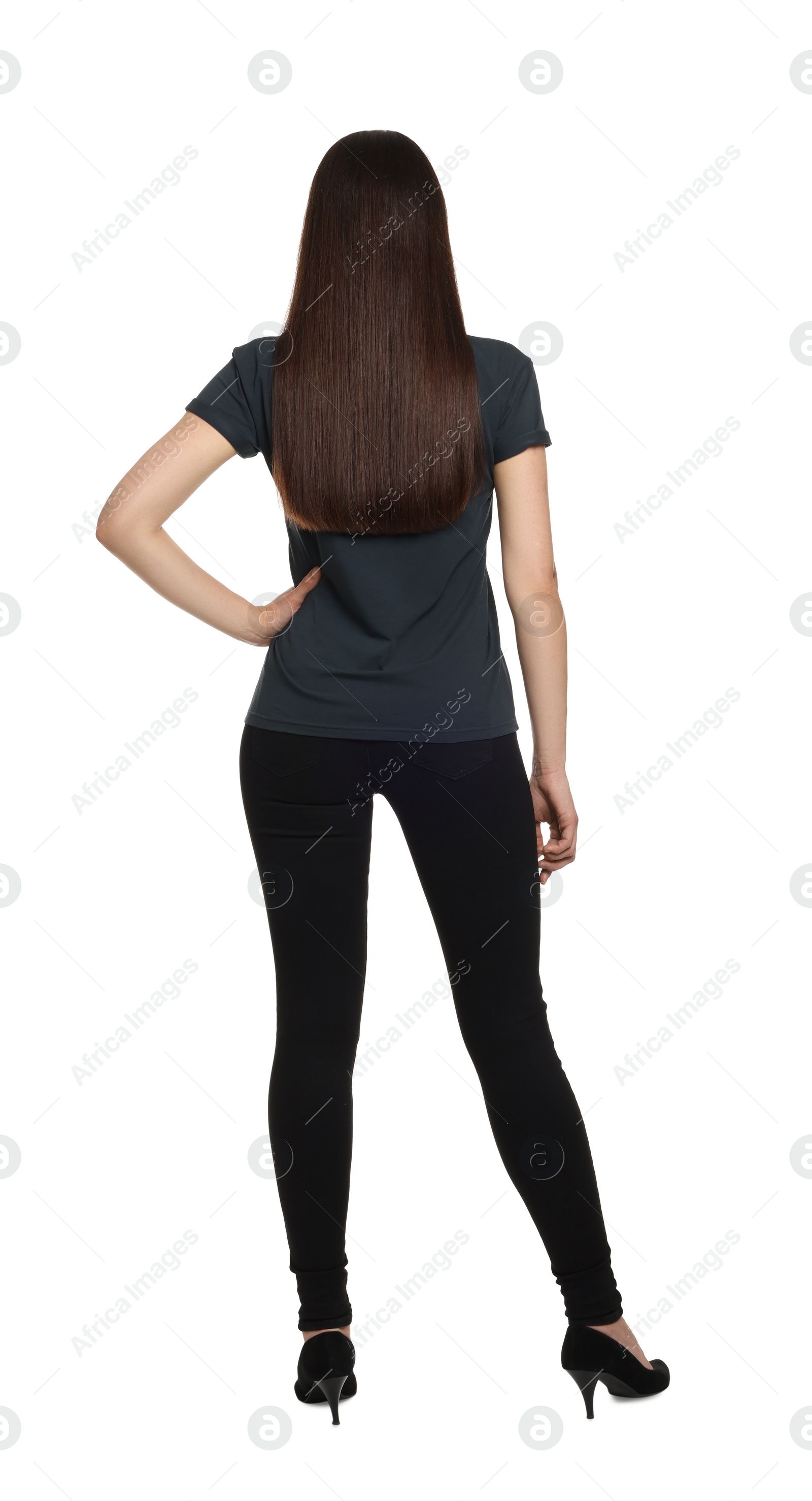 Photo of Woman wearing stylish black jeans on white background, back view