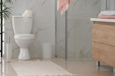 Photo of Interior of modern bathroom with toilet bowl