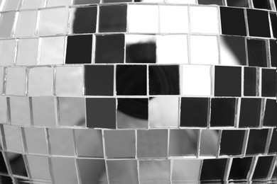 Photo of Bright shiny disco ball as background, closeup