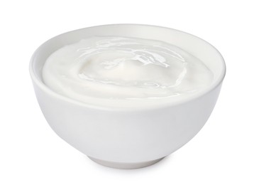 Photo of Bowl with delicious organic yogurt isolated on white