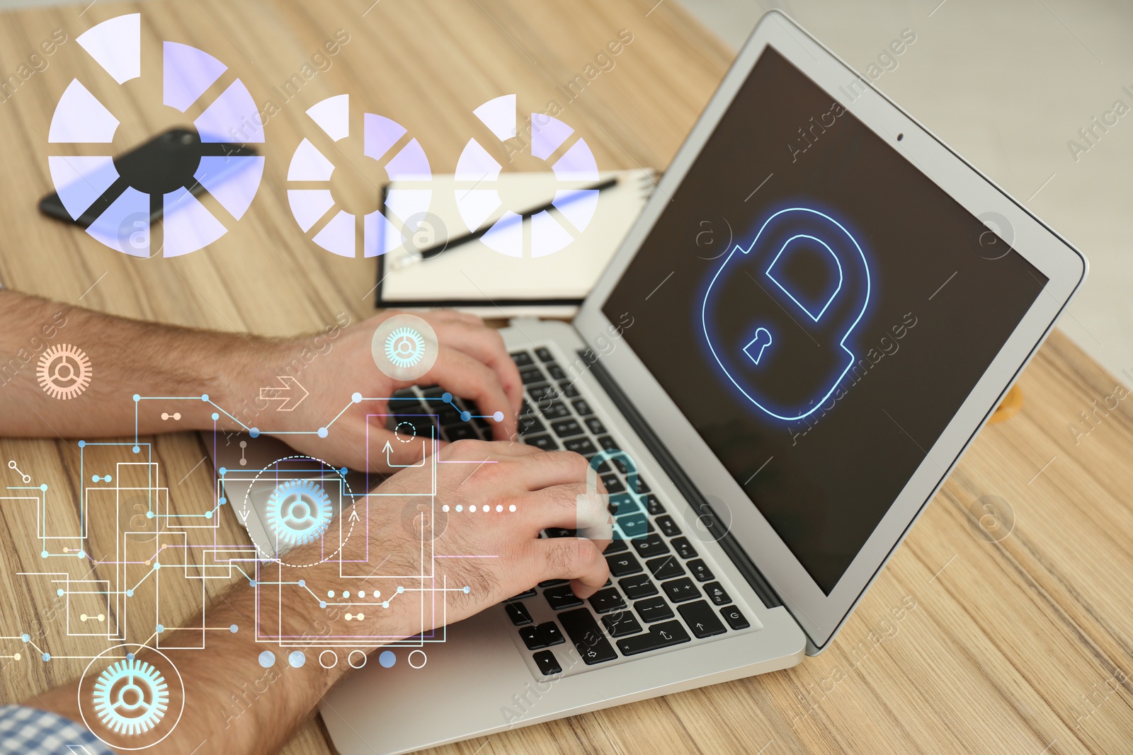 Image of Cyber attack protection. Man using modern laptop with lock illustration at table, closeup