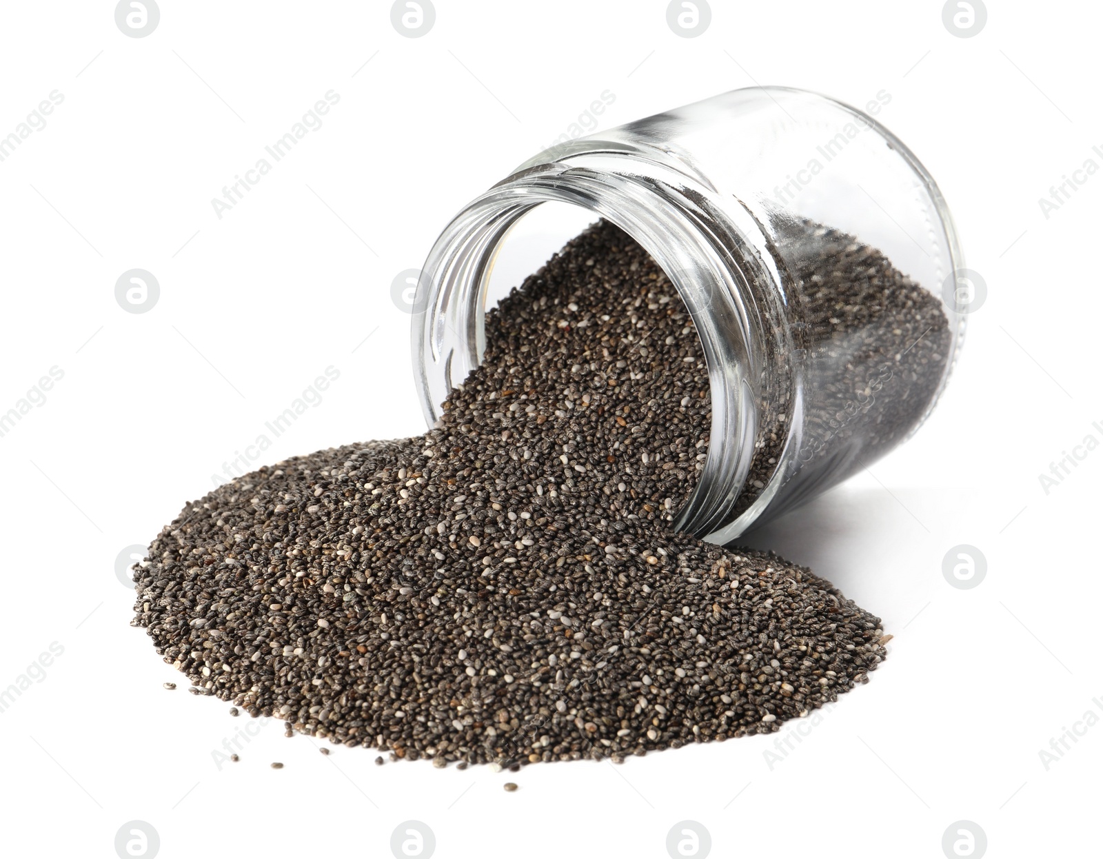Photo of Overturned jar with chia seeds on white background