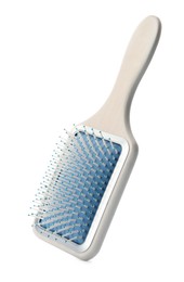 Photo of New modern hair brush isolated on white