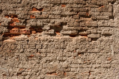 Photo of Texture of old brick wall as background, closeup