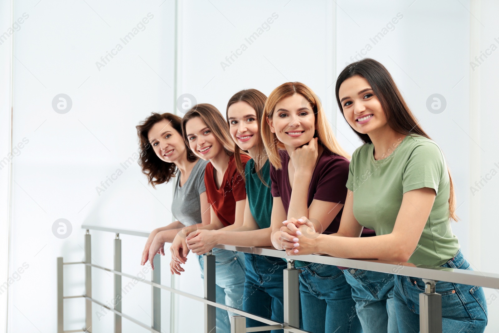 Photo of Portrait of happy ladies indoors. Women power concept