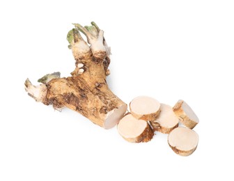 Photo of Fresh cut horseradish root isolated on white