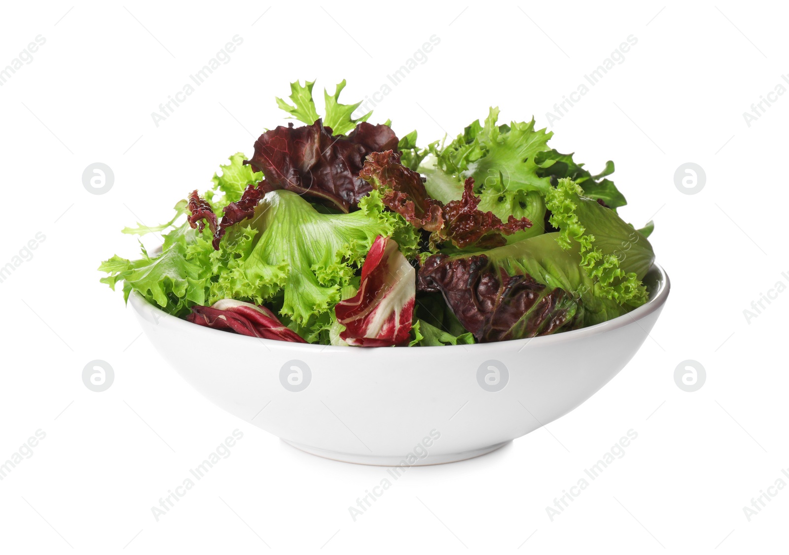 Photo of Bowl with leaves of different lettuce on white background