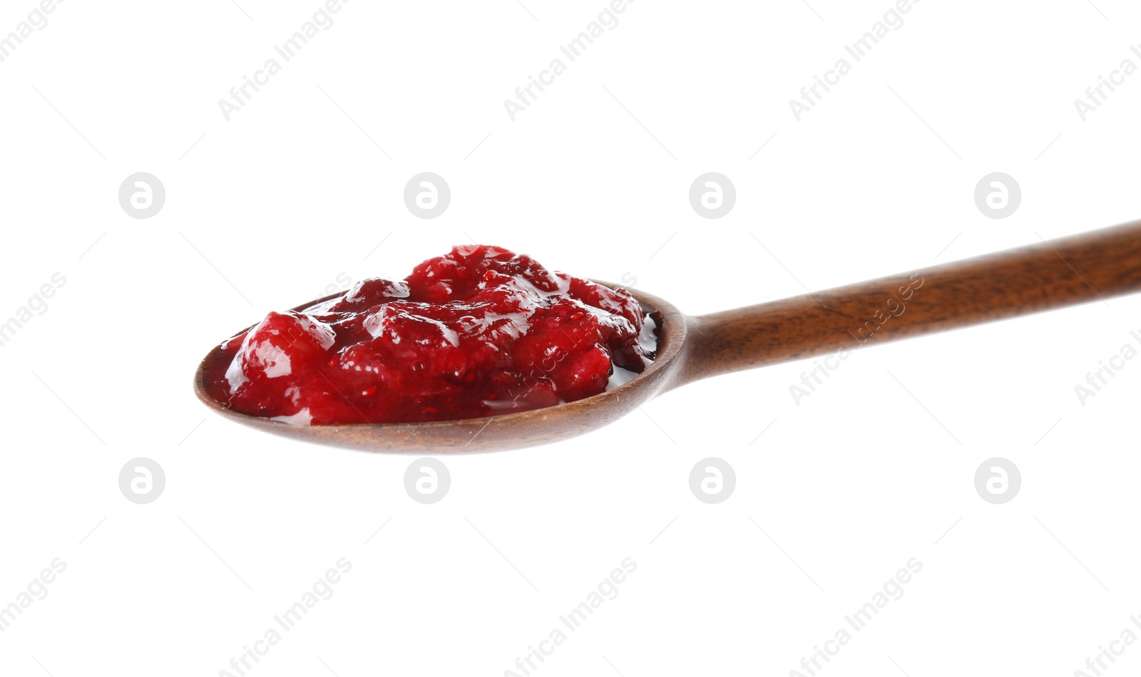 Photo of Spoon with cranberry sauce on white background