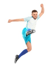 Young man playing football on white background