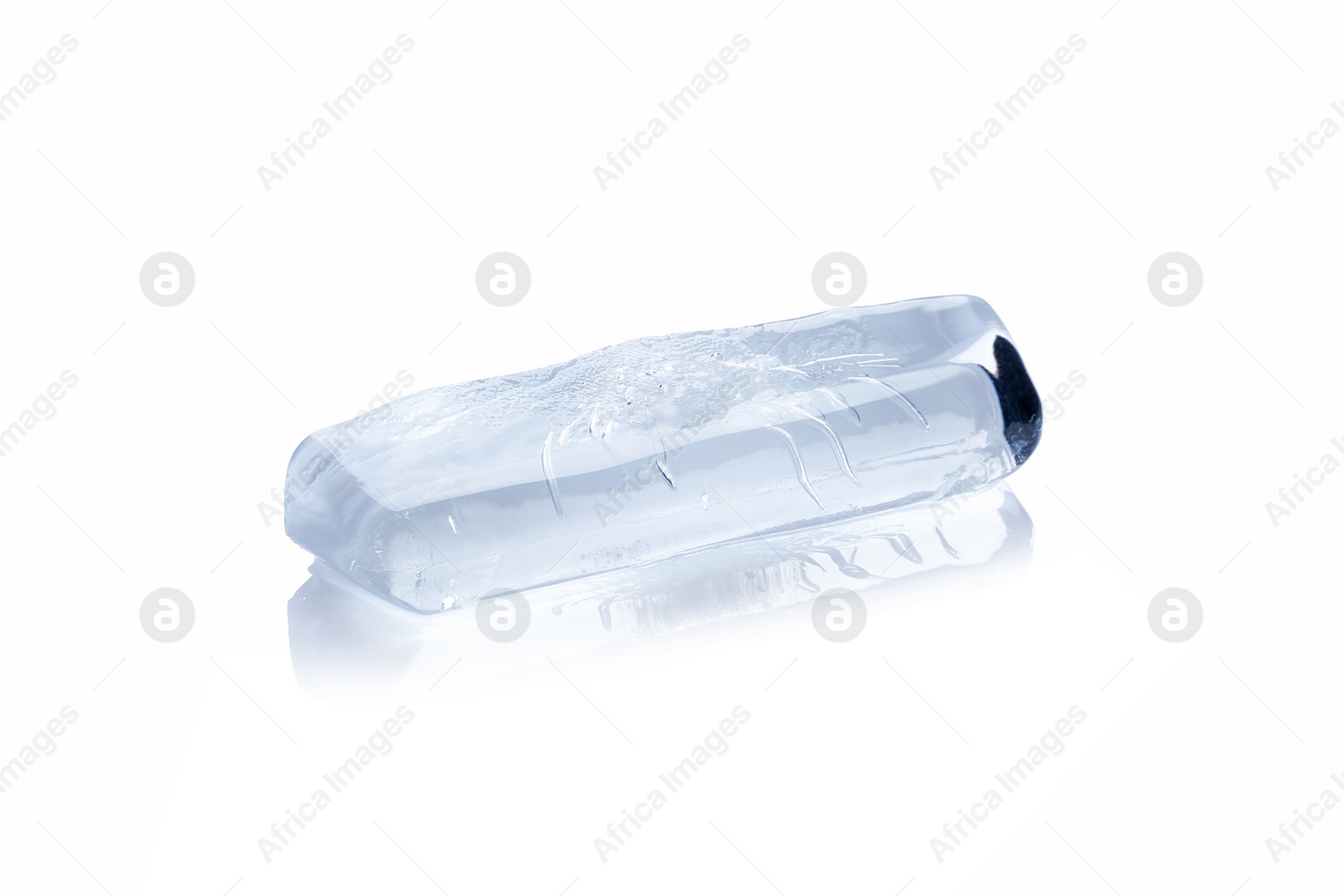 Photo of Piece of ice melting on white background