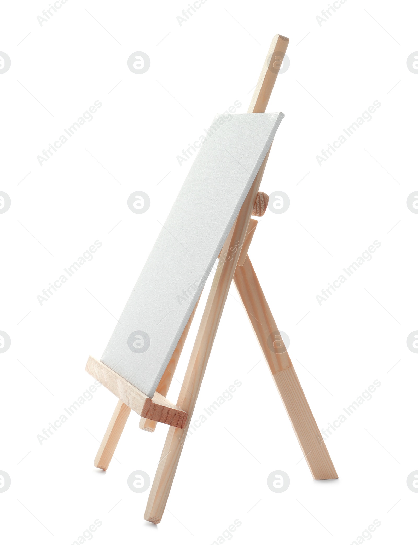 Photo of Wooden easel with blank canvas board on white background. Children's painting