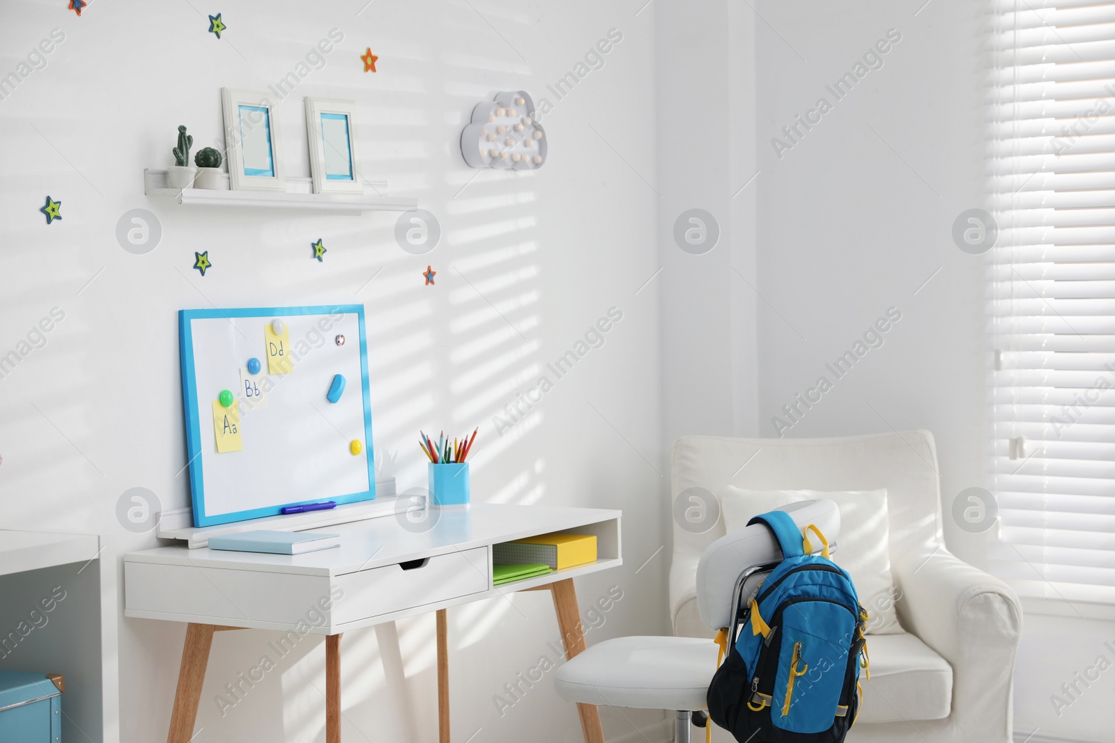 Photo of Modern child room interior with stylish furniture