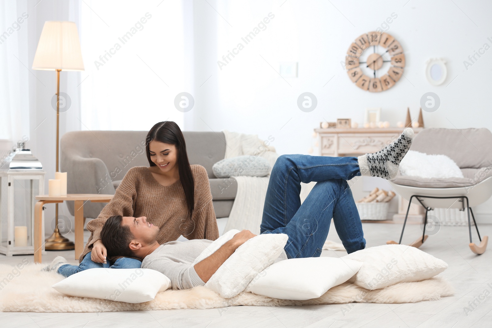 Photo of Happy couple spending time together at home. Winter vacation