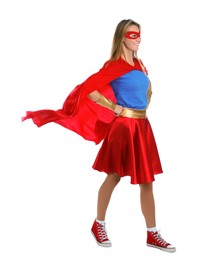 Photo of Confident woman wearing superhero costume on white background
