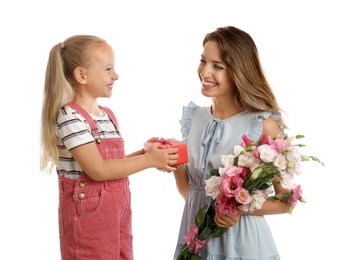 Photo of Little daughter congratulating her mom on white background. Happy Mother's Day