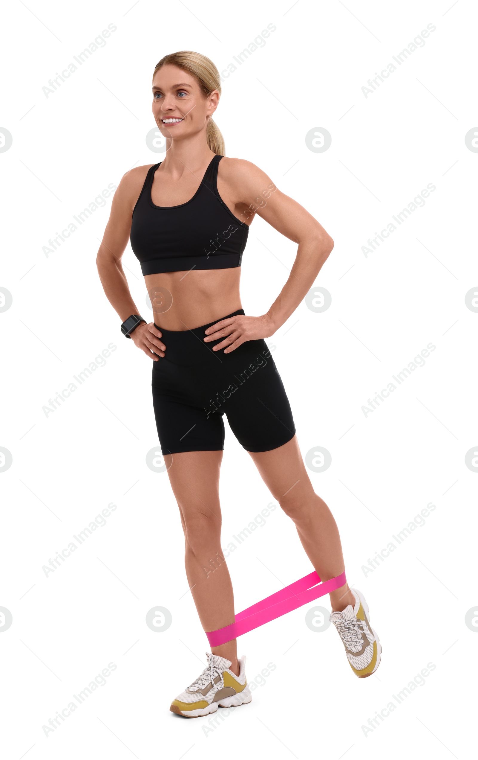 Photo of Woman exercising with elastic resistance band on white background