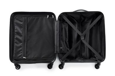 Photo of Open suitcase for travelling on white background, top view