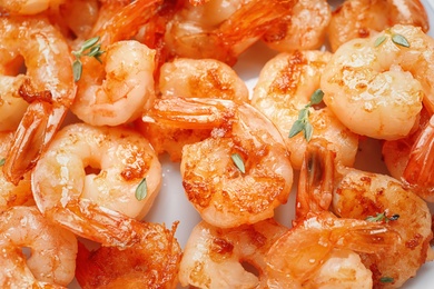 Photo of Delicious fried shrimps, closeup