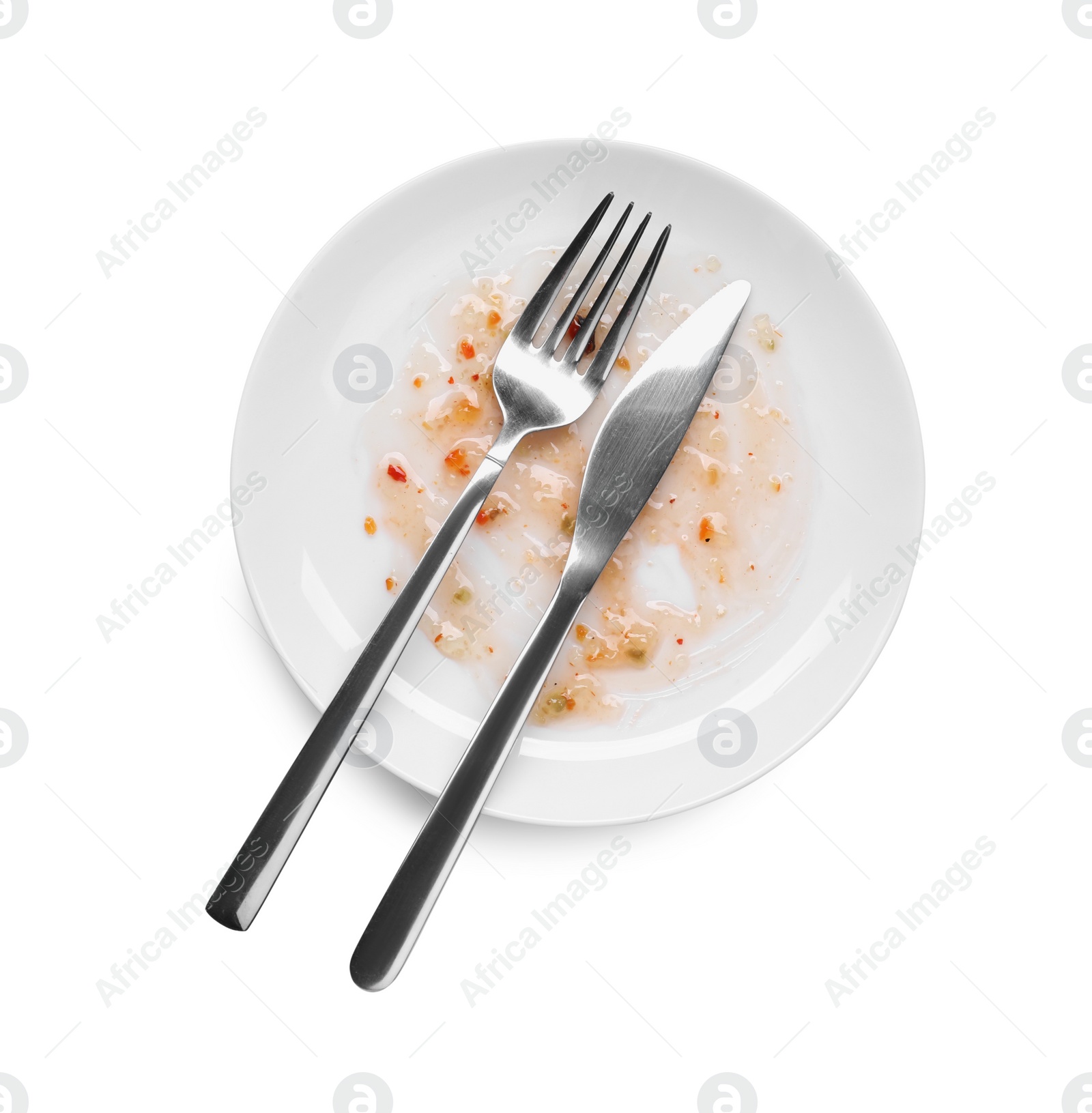 Photo of Dirty plate and cutlery on white background, top view