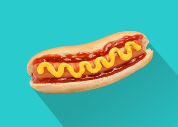 Image of Yummy hot dog with ketchup and mustard on turquoise background