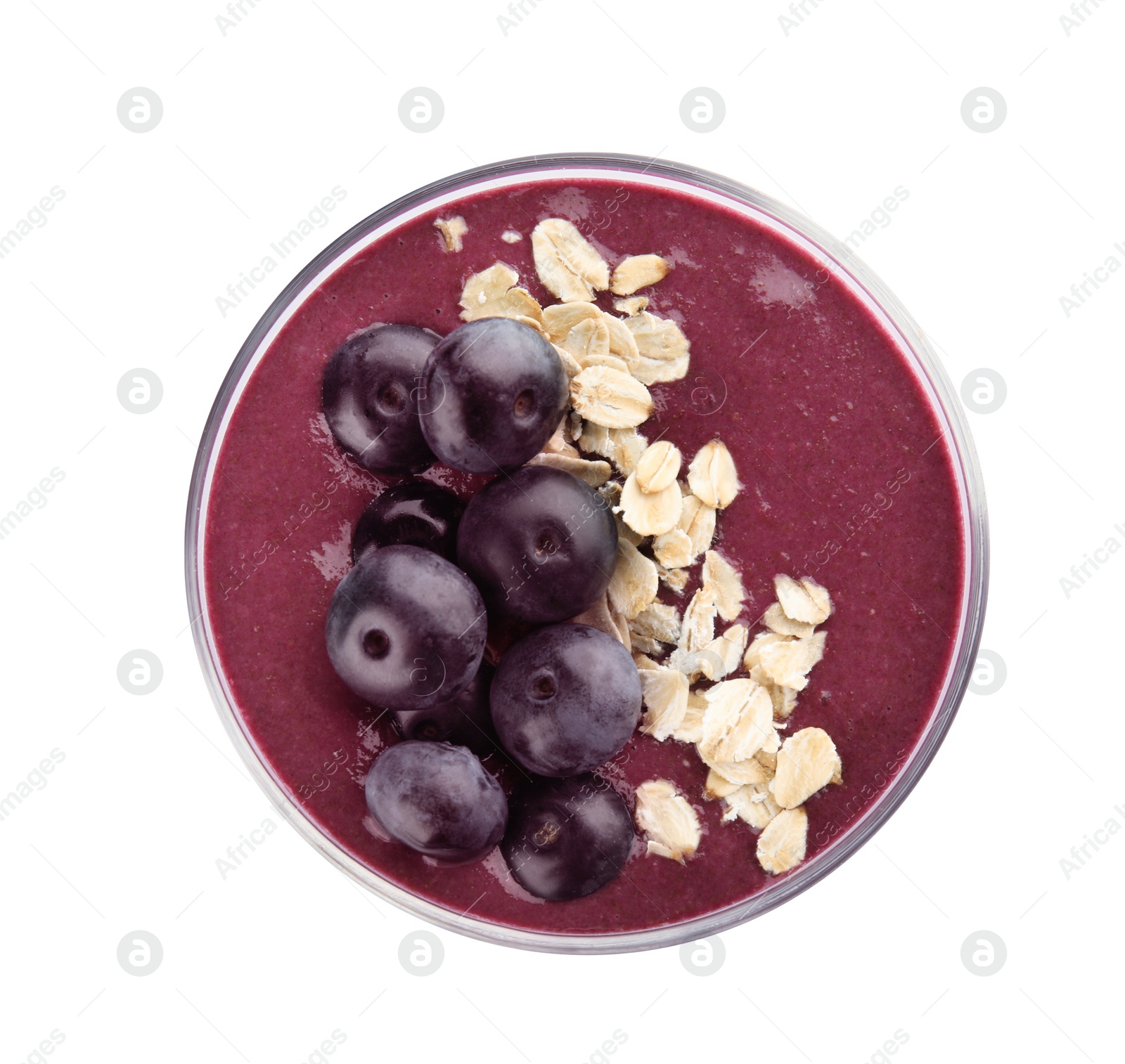 Photo of Glass with tasty acai smoothie on white background, top view