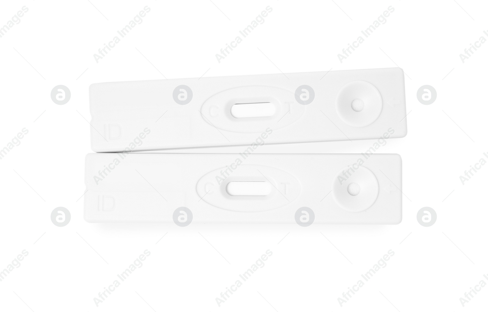 Photo of Two disposable express tests for hepatitis on white background, top view