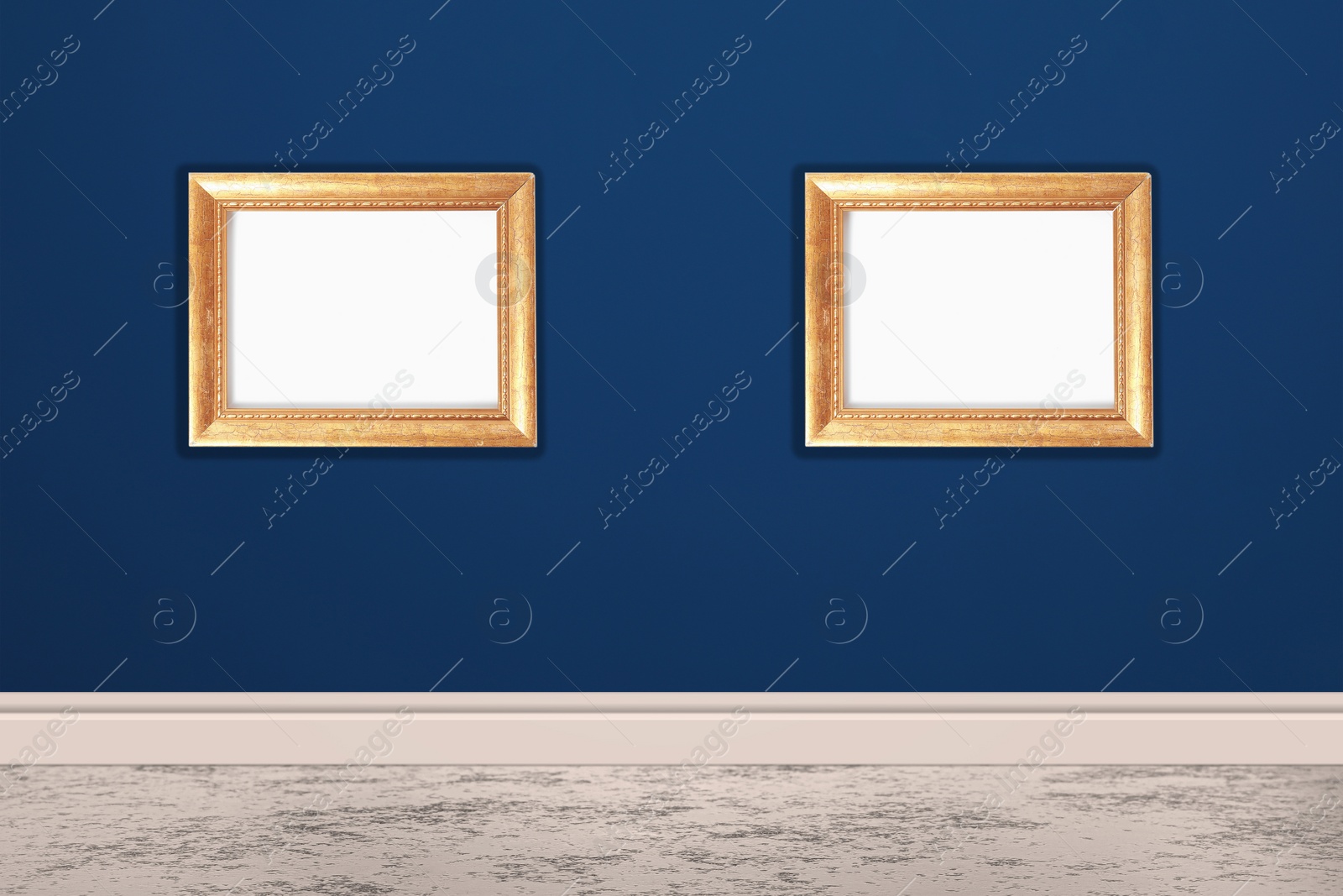 Image of Frames with empty canvases on blue wall in modern art gallery. Space for design