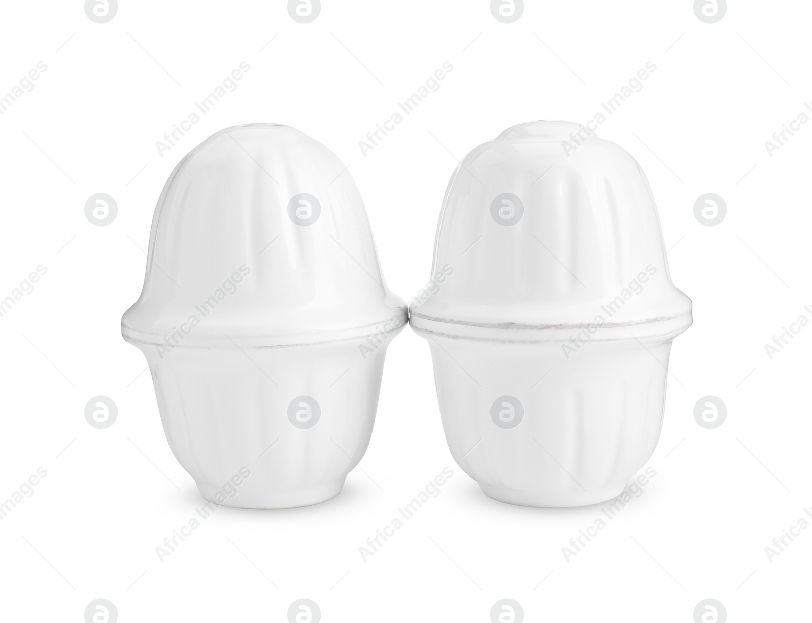 Photo of Salt and pepper shakers isolated on white