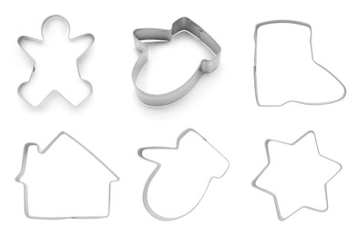Image of Set with cookie cutters of different shapes on white background