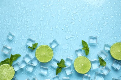 Photo of Ice cubes, mint and cut limes on turquoise background, flat lay with space for text. Refreshing drink ingredients