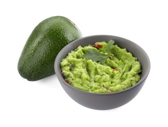 Photo of Delicious guacamole and fresh avocado isolated on white