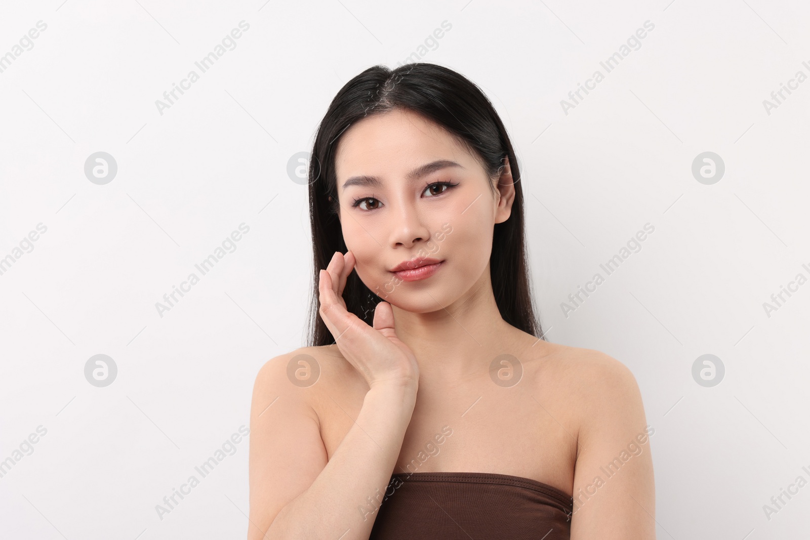 Photo of Portrait of beautiful woman on white background