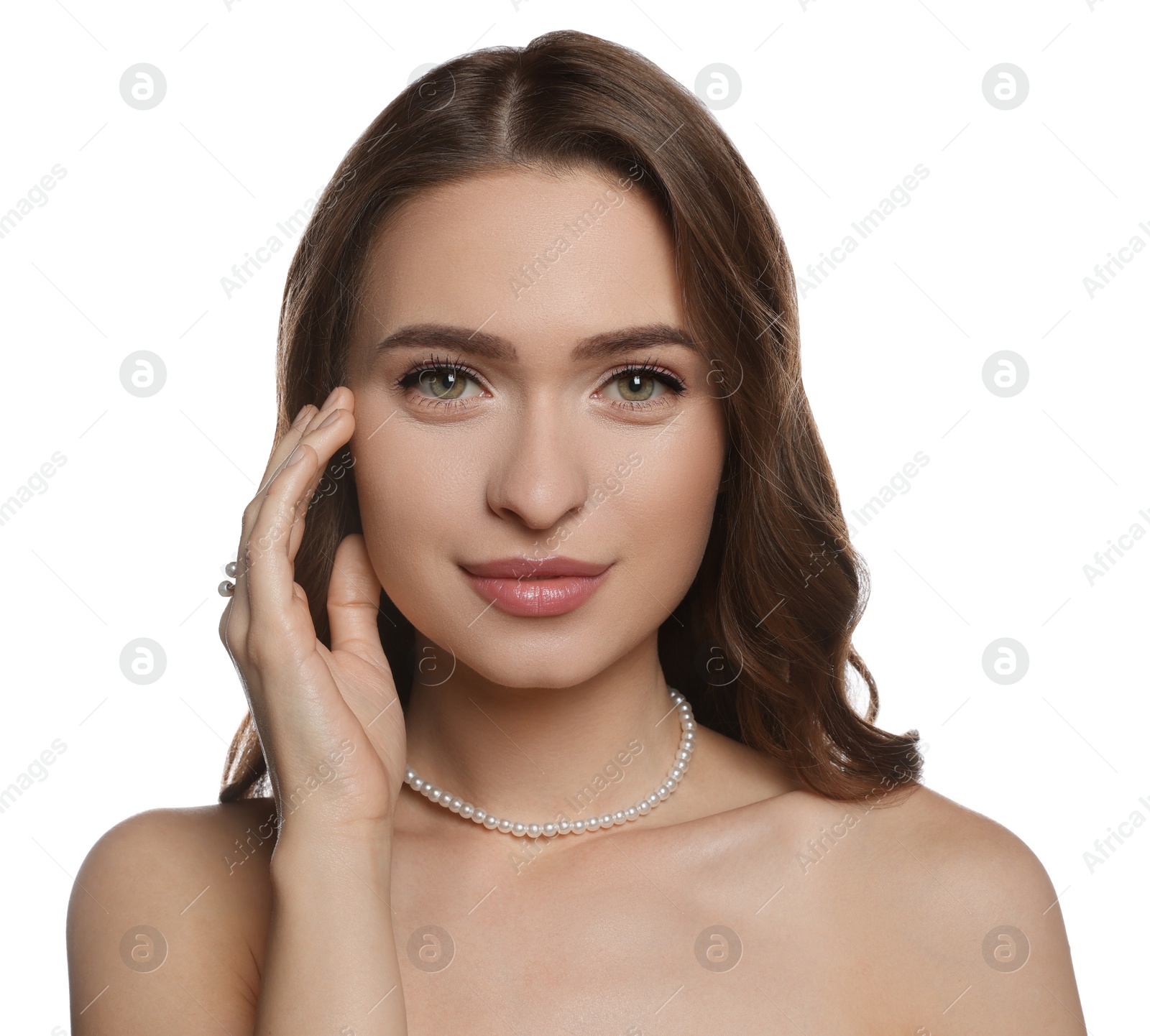 Photo of Young woman with elegant pearl jewelry on white background