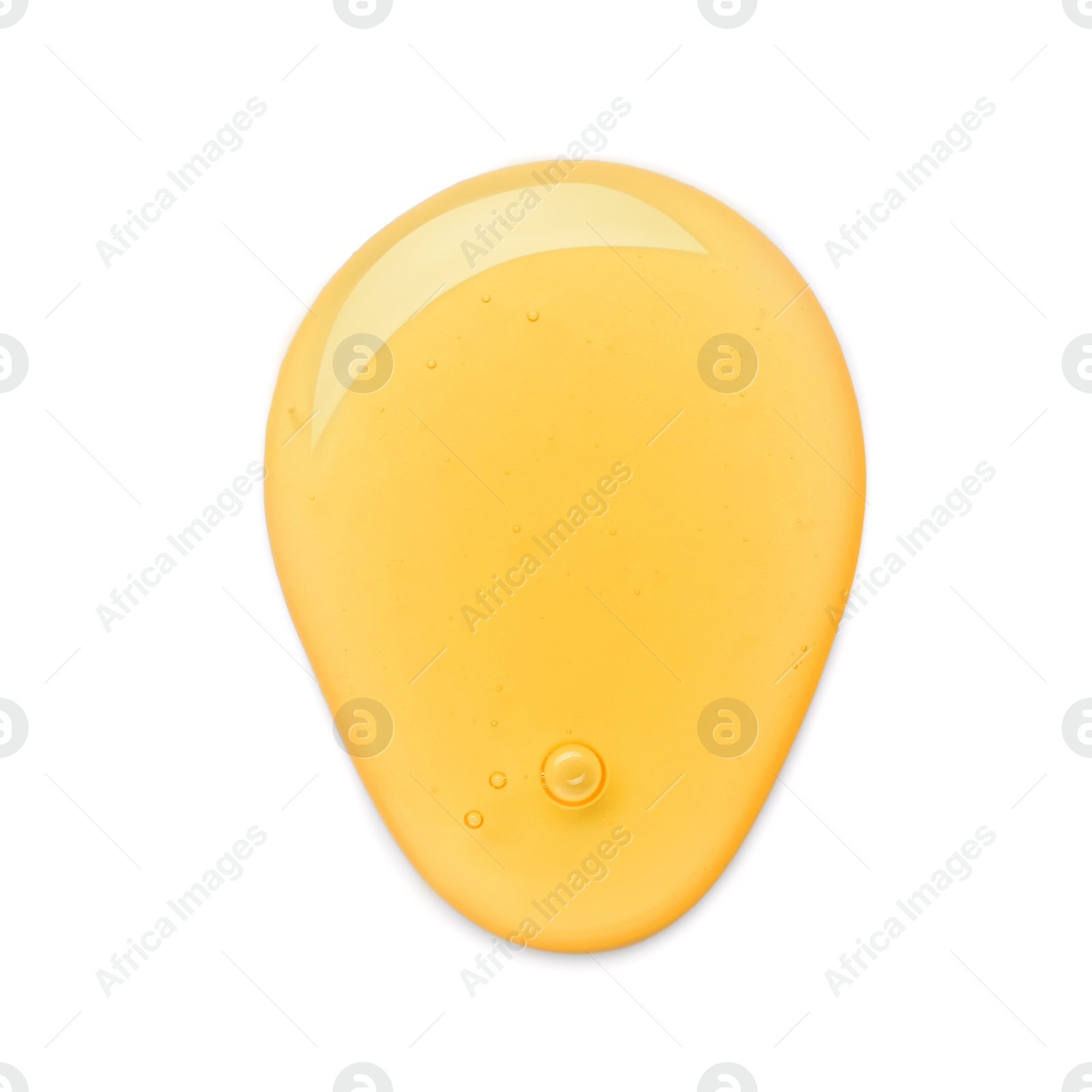 Photo of Drop of tasty natural honey isolated on white, top view