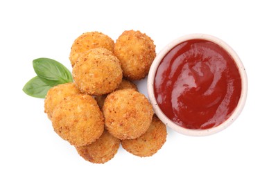 Pile of delicious fried tofu balls, ketchup and basil on white background, top view
