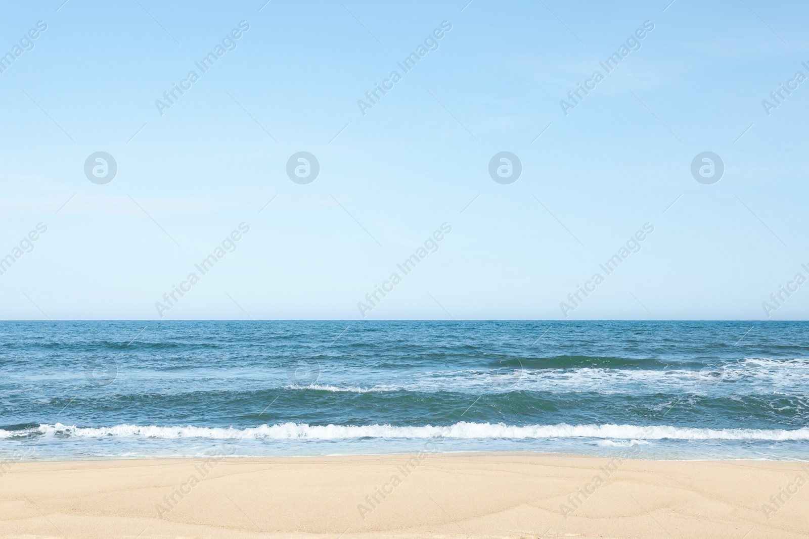 Photo of Picturesque view of beautiful sea and sandy beach on sunny day