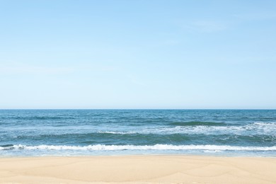 Photo of Picturesque view of beautiful sea and sandy beach on sunny day