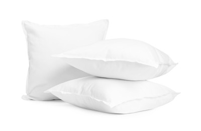 Photo of Three new soft pillows isolated on white