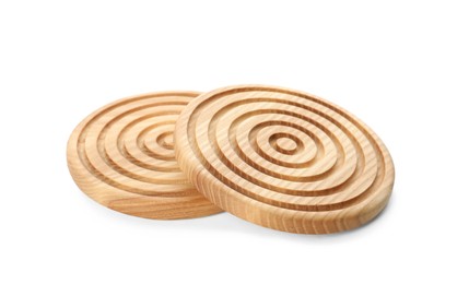 Photo of Stylish wooden cup coasters on white background