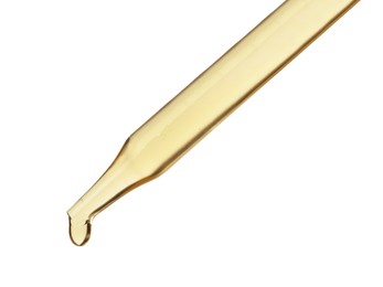 Photo of Dripping hydrophilic oil from pipette on white background