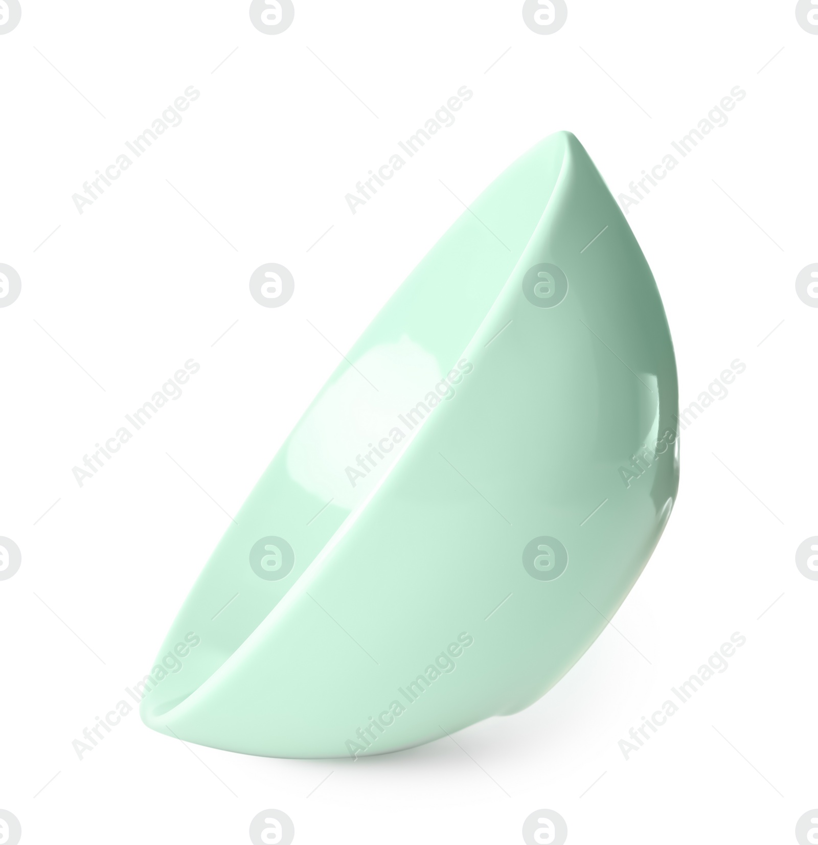 Photo of Clean light green bowl isolated on white