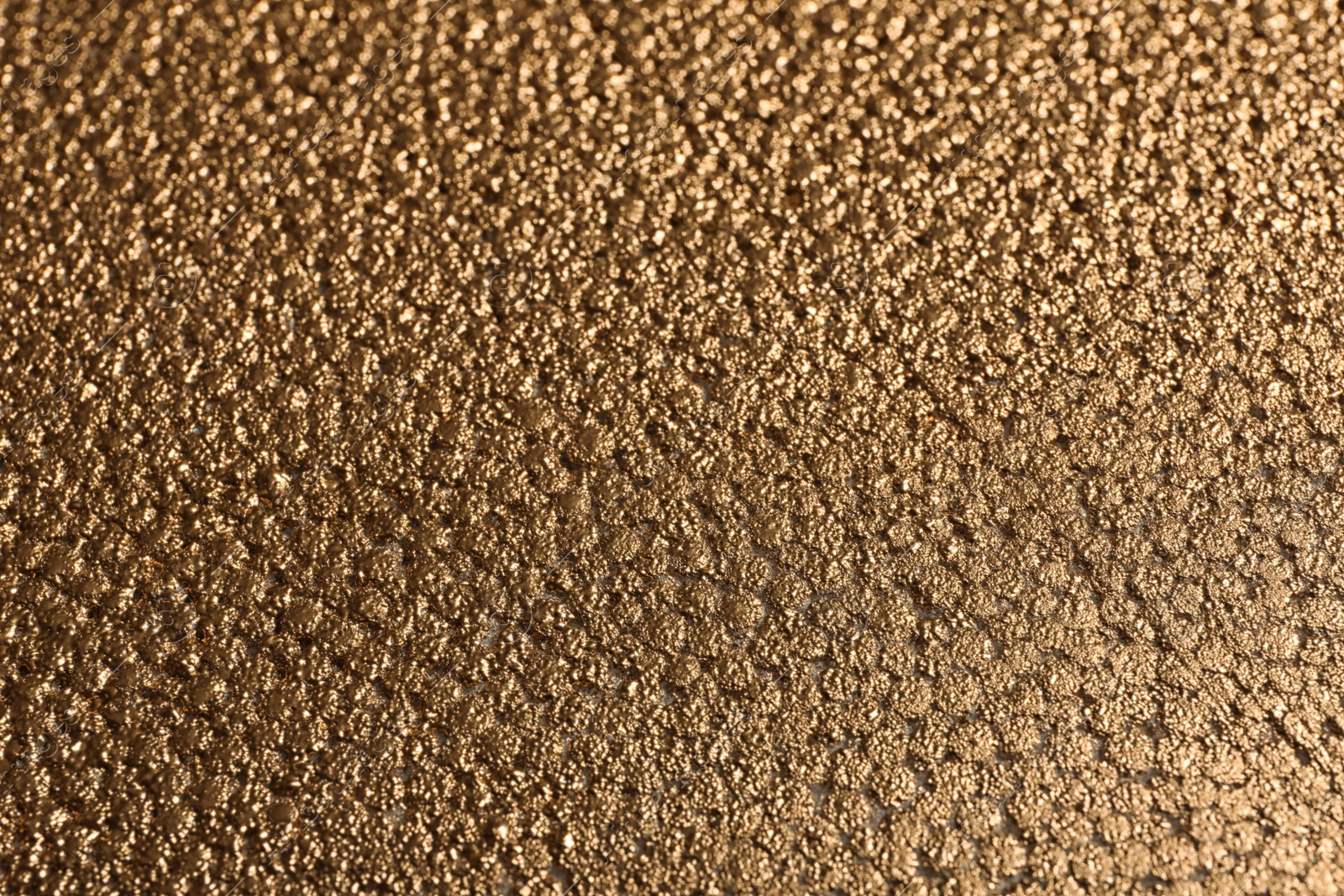 Photo of Beautiful view of rough golden surface as background