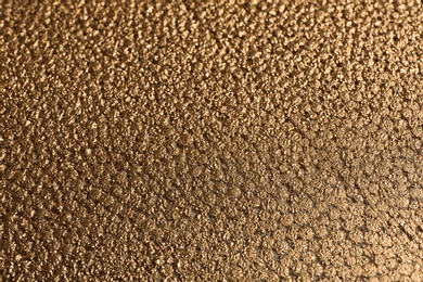 Photo of Beautiful view of rough golden surface as background