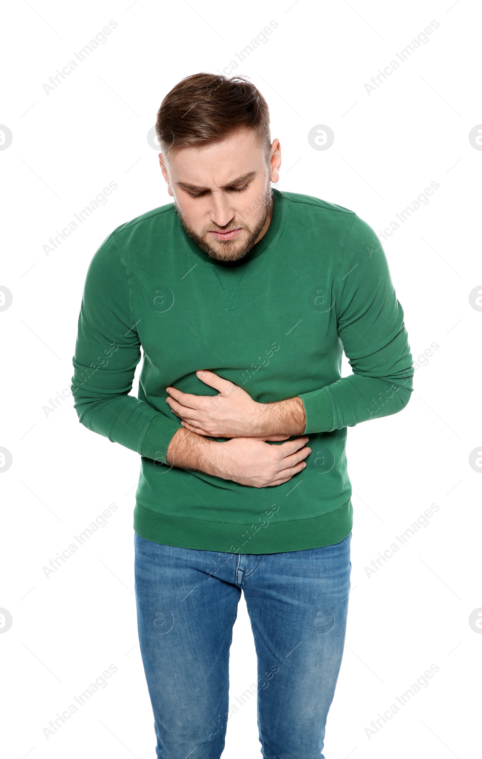 Photo of Young man suffering from digestive disorder isolated on white