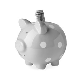 Photo of Piggy bank with banknotes on white background
