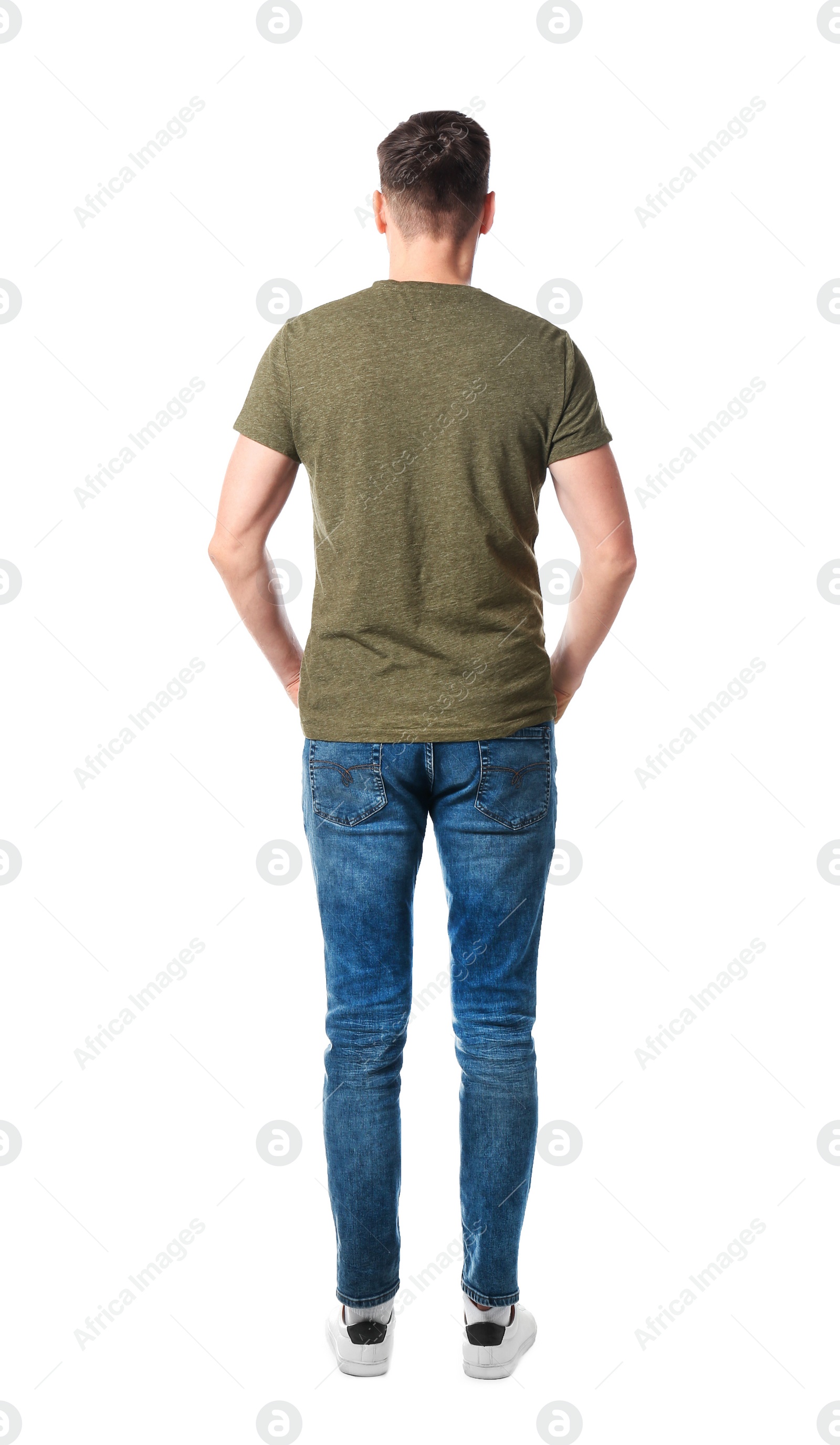 Photo of Young man in casual clothes posing on white background