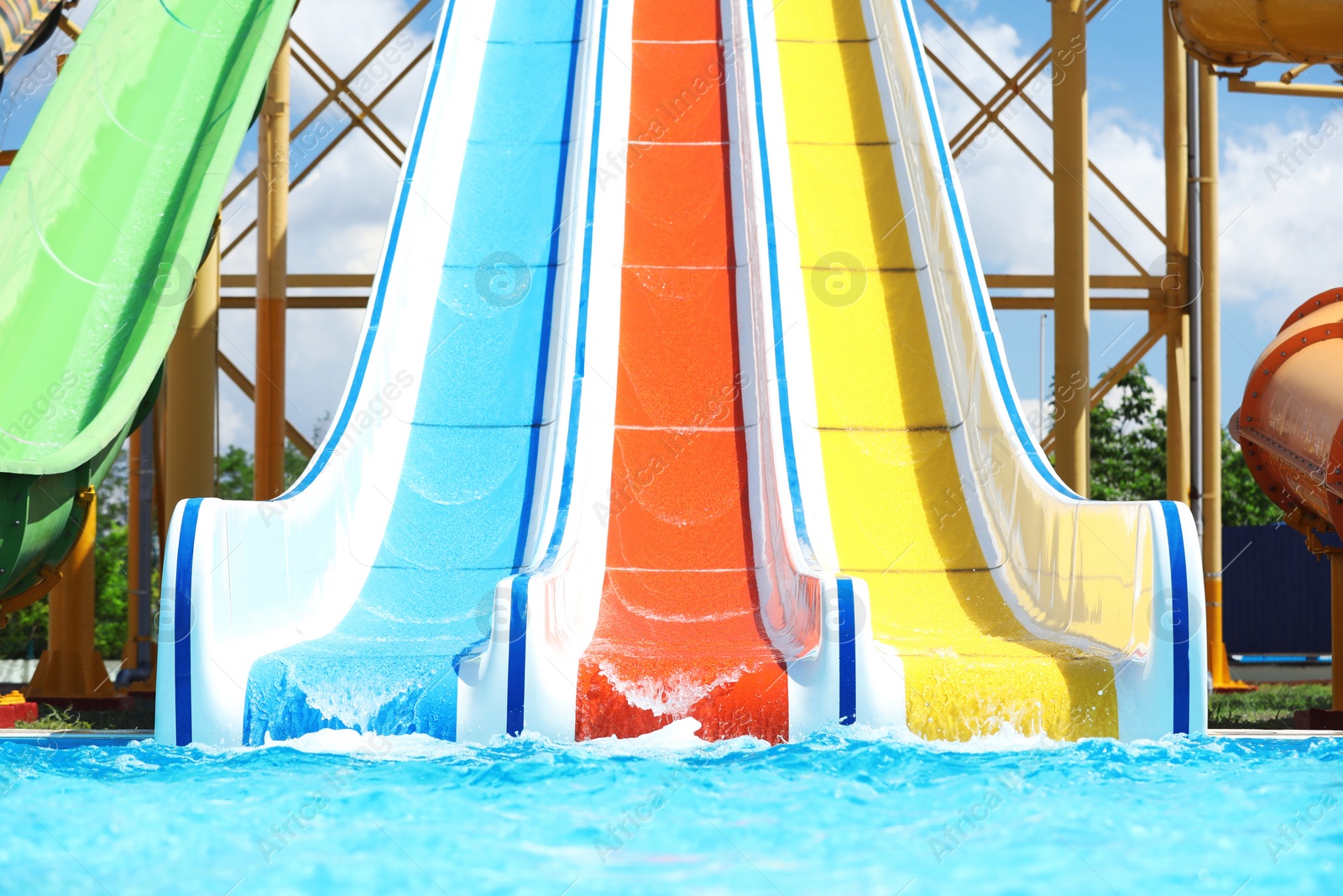 Photo of Water park with colorful slides. Summer vacation