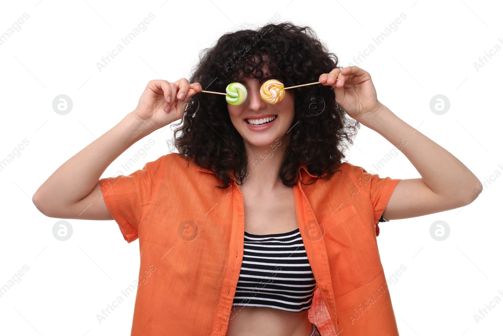 Photo of Beautiful woman covering eyes with lollipops on white background